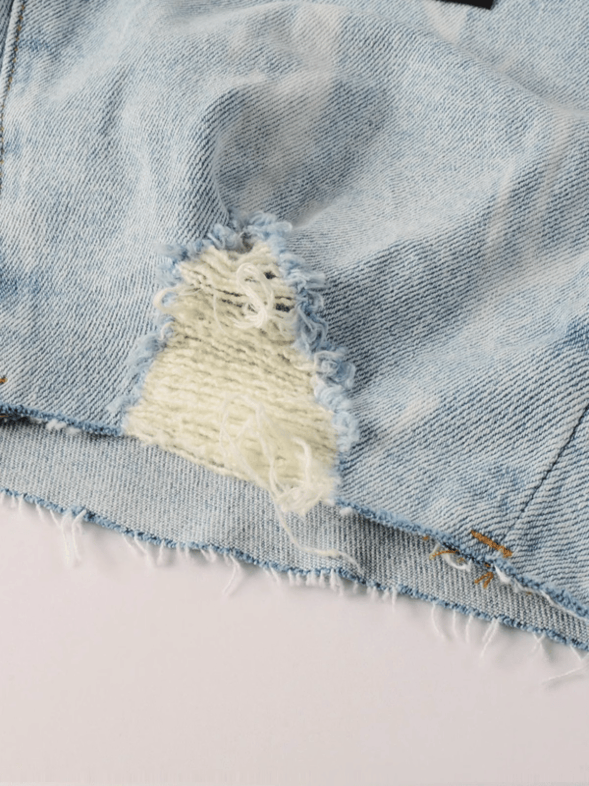 Light Washed Ripped Jeans