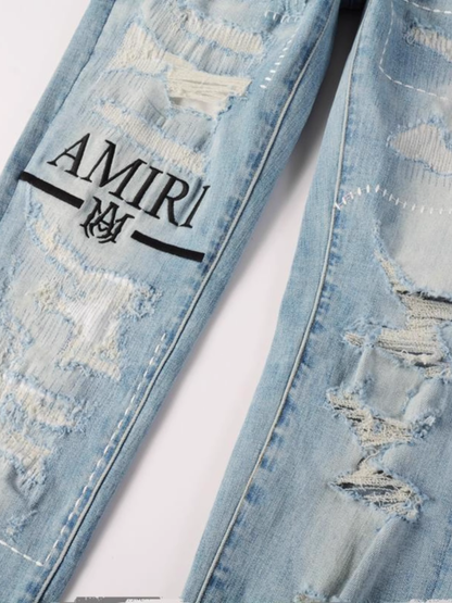 Light Blue Ripped Writing Jeans